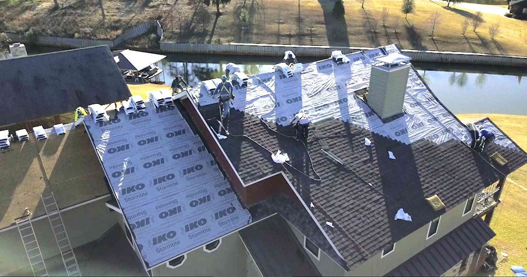 Architectural shingle roof replacement in progress on a Huntsville, AL home